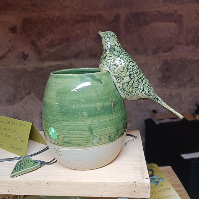 Vase avec son oiseau 