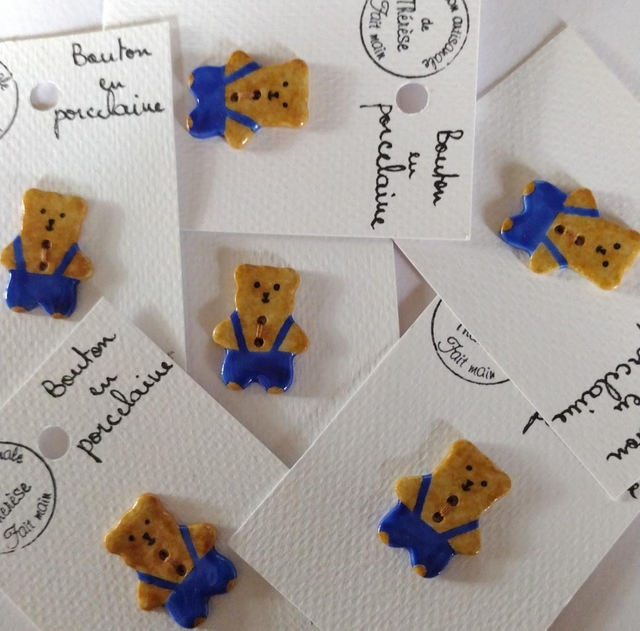 Ourson salopette bleue 