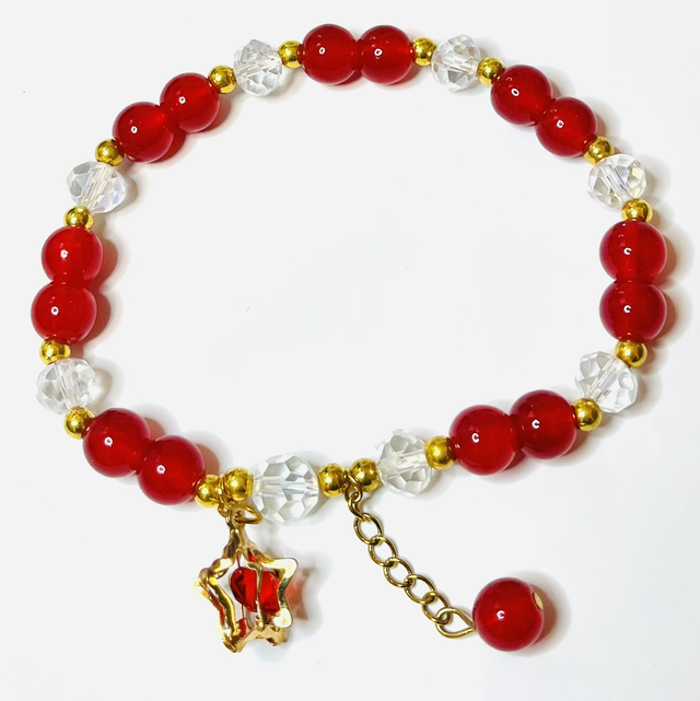 Roze- en Goudkleurige Vlinderarmband – Elegant & Betekenisvol