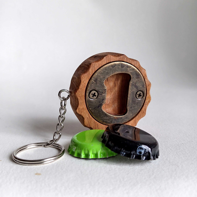 Décapsuleur porte clés capsule