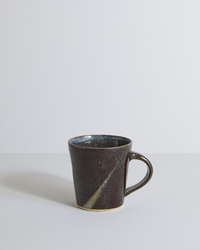 A single mug in blue mist