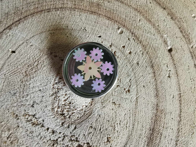 Fleur et engrenages holo