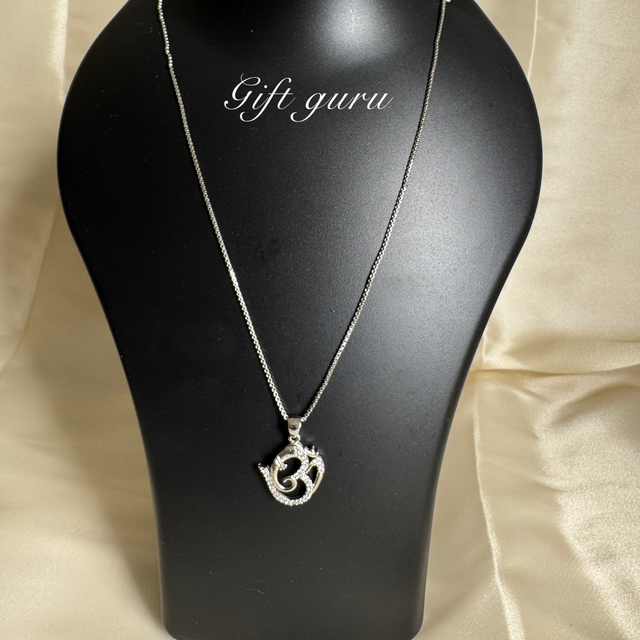 Silver Om pendant chain with ear rings 