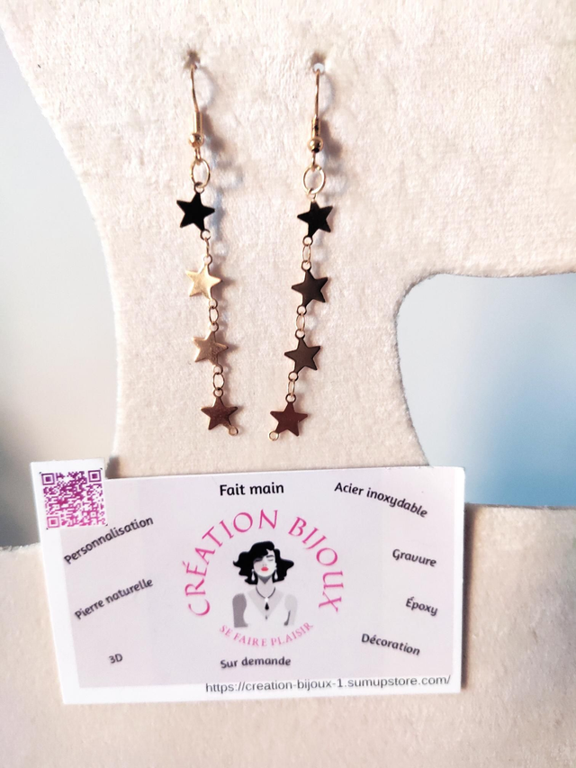 Boucle d'oreille pendante étoiles