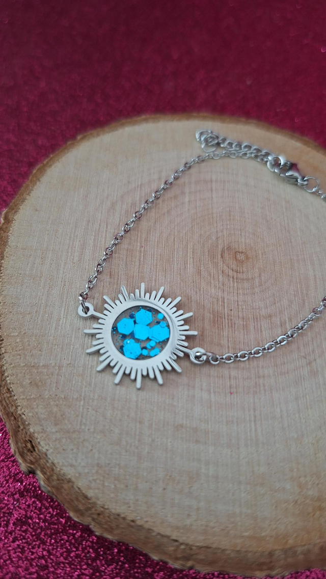 Bracelet soleil argenté paillettes bleues claires