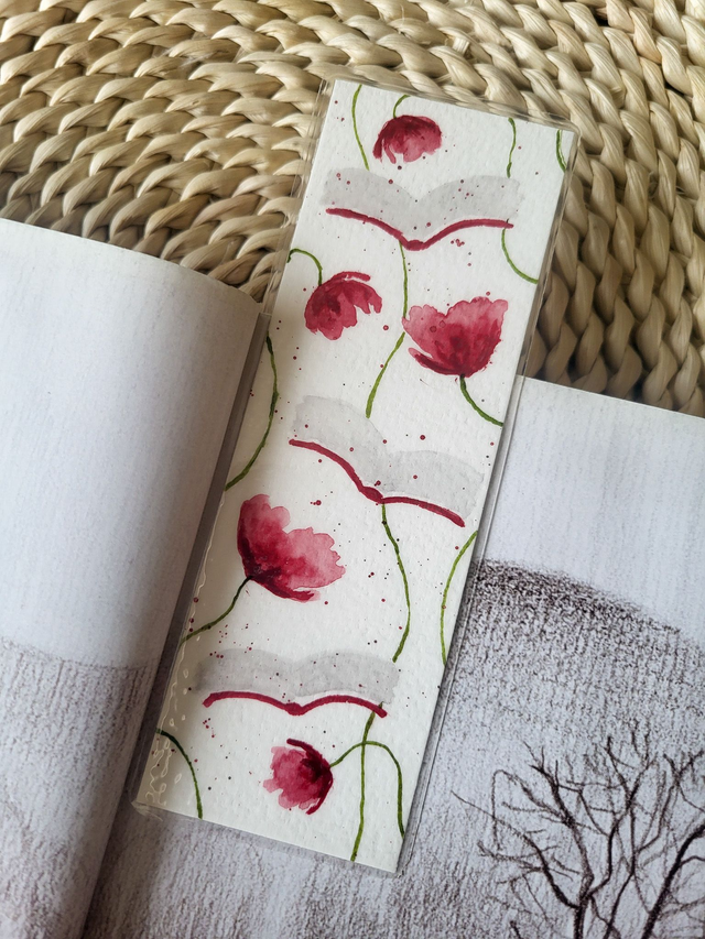 Un marque-page les fleurs et les livres 