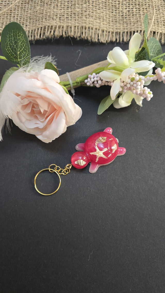 Portes clés tortue rouge avec différentes finition ( Coquillages, Fleurs etc...)