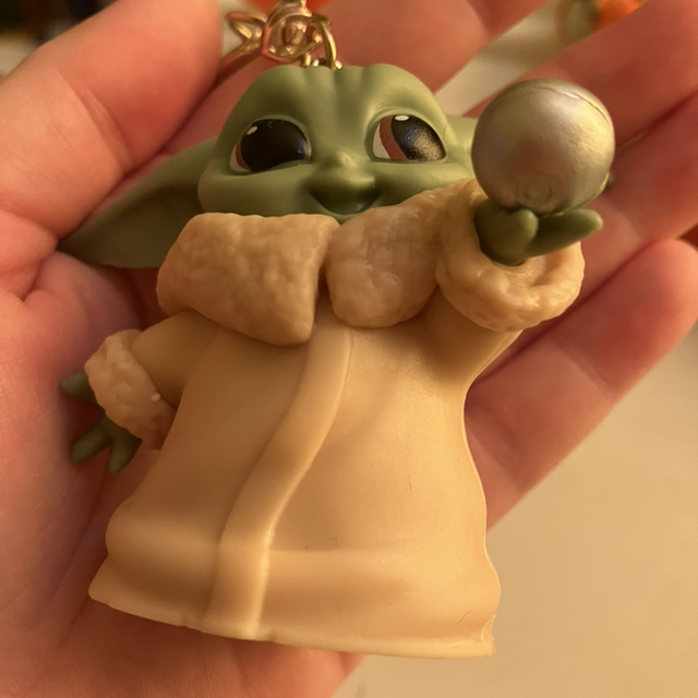 Grogu with spaceship nob