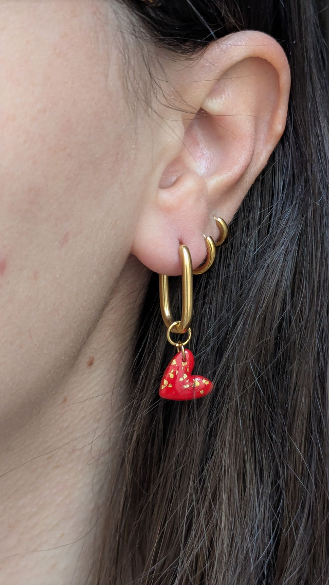 Créoles dorées ovales à personnaliser avec les charms