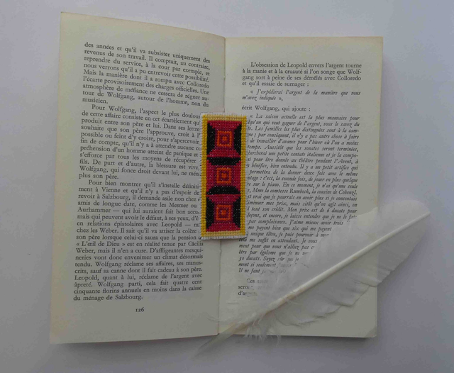 Le marque-page rougeoyant 