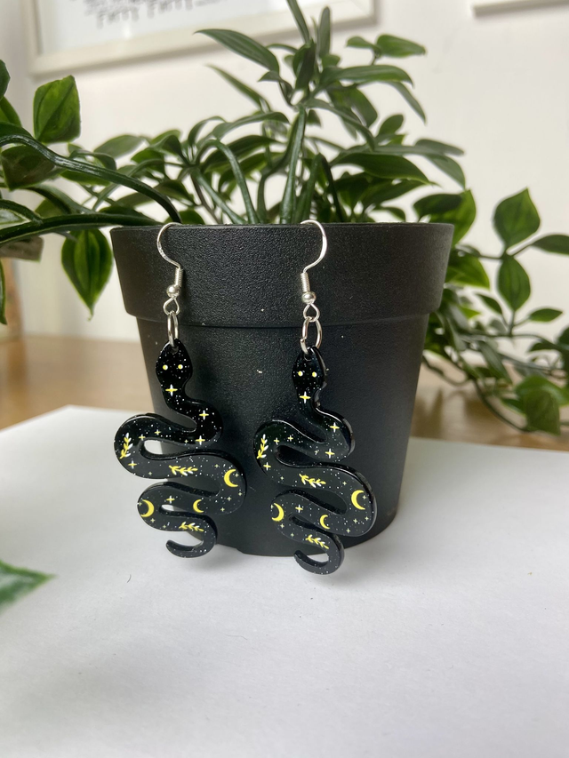 Black and gold snake earrings.