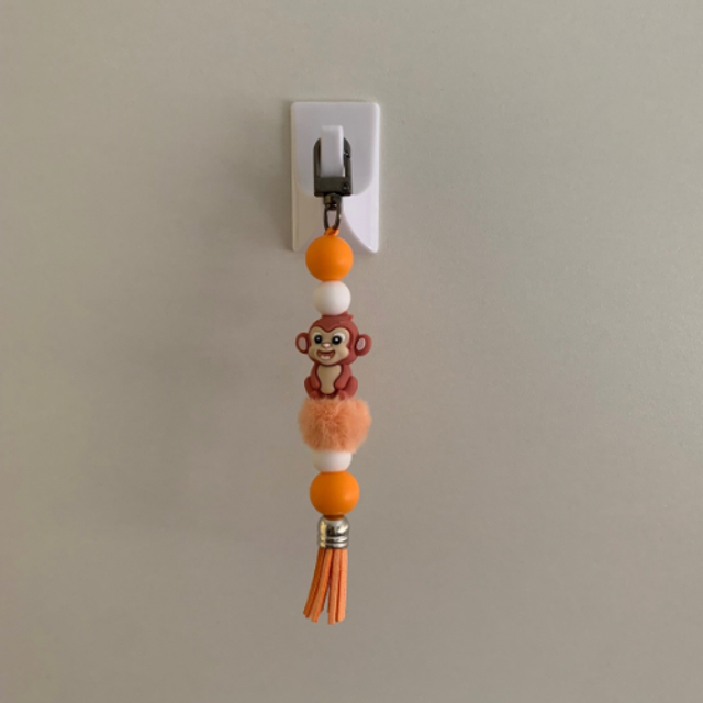 Aap bruin oranje met franje 