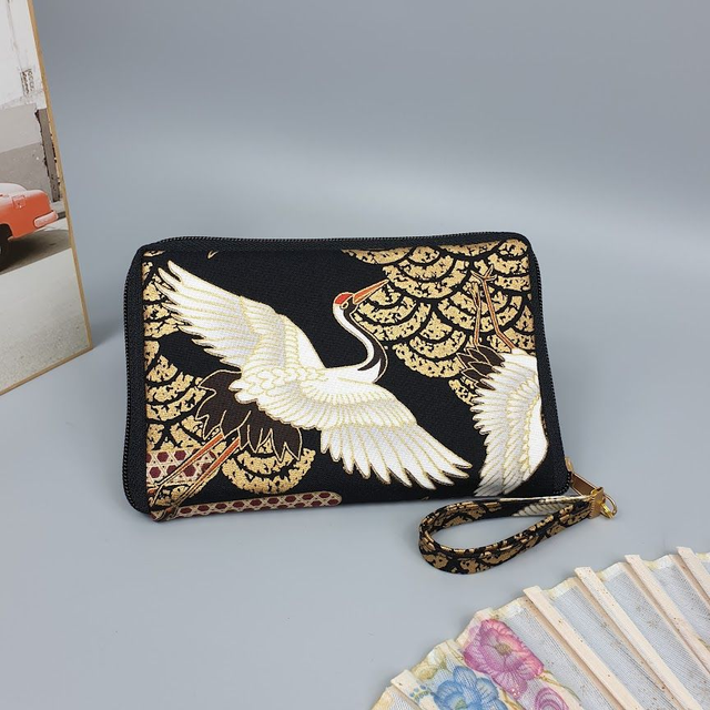 Portefeuille court zippé &quot;Grues&quot; noir doré