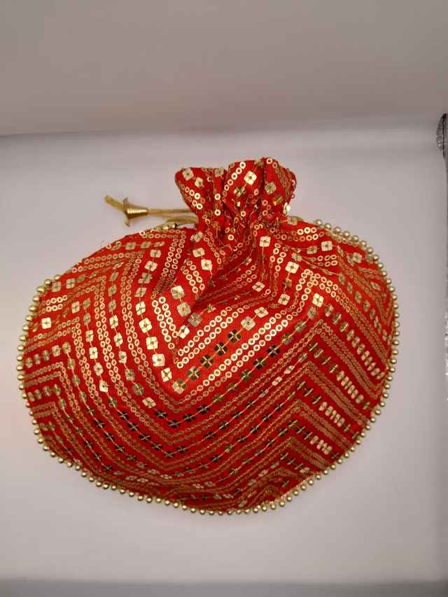 Bombonera boho fucsia