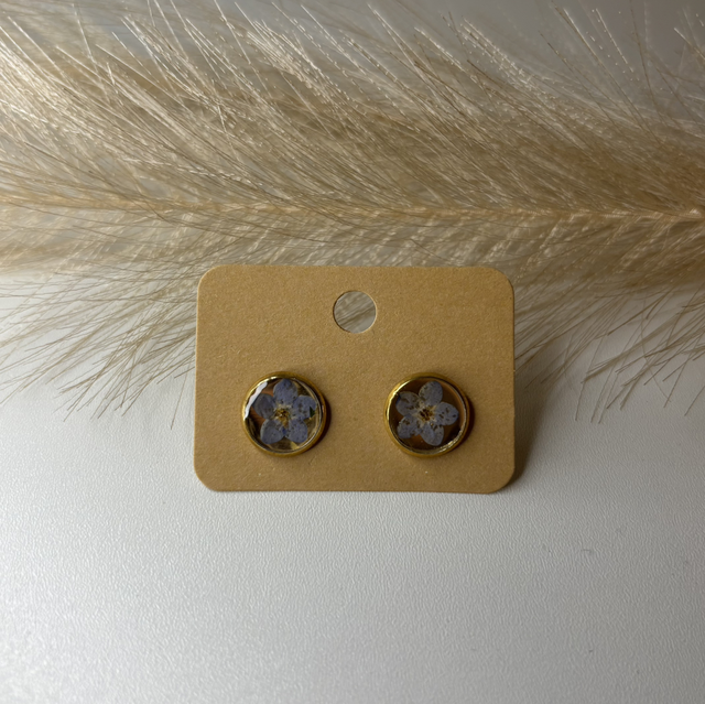 Clous d’oreille fleur bleu clair 