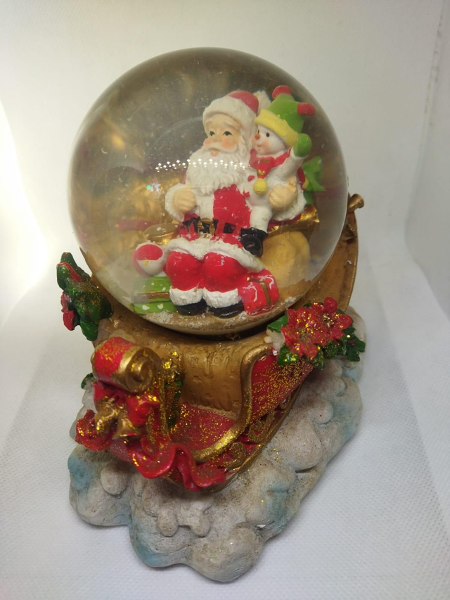 Palla di vetro con Babbo su slitta 