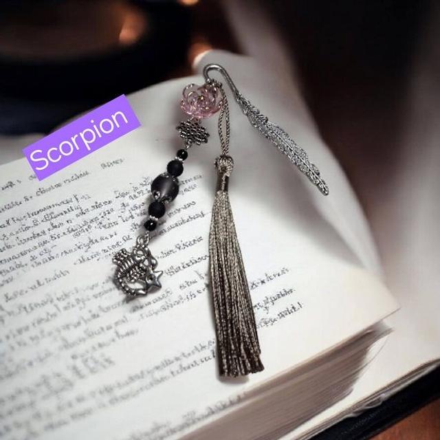 Signet, Marque-page / Signe astrologique