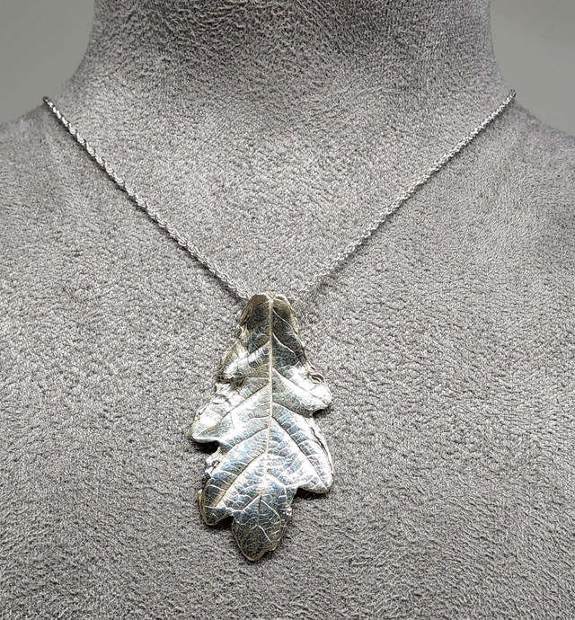 Oak leaf pendant on silver necklace