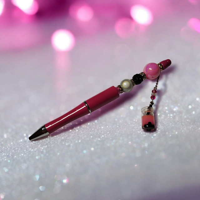 Stylo perles fuchsia argenté 