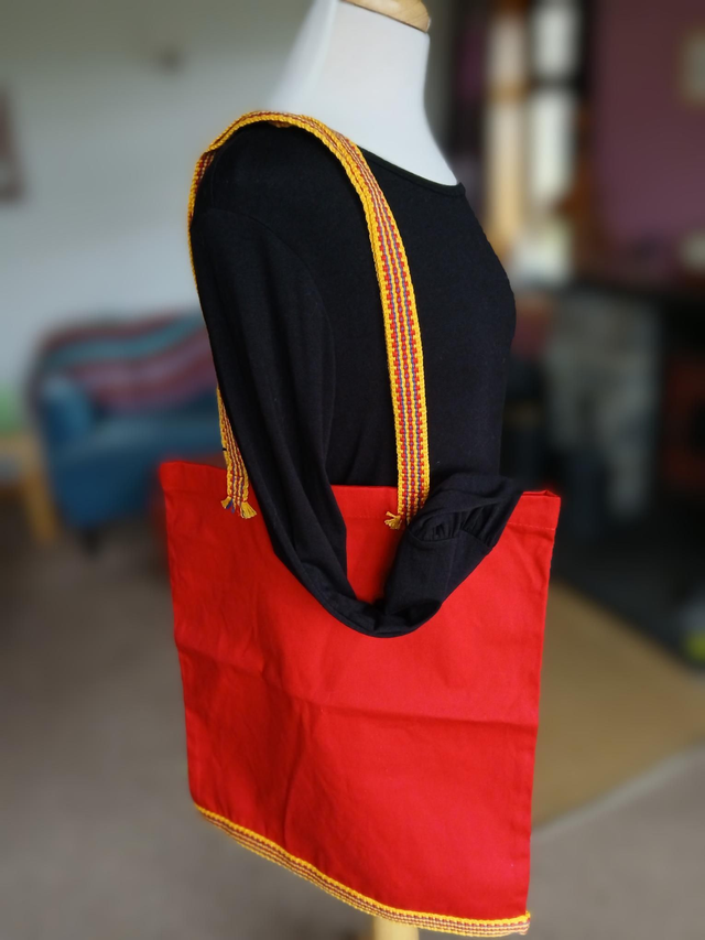 Canvas tote bag with handwoven strap