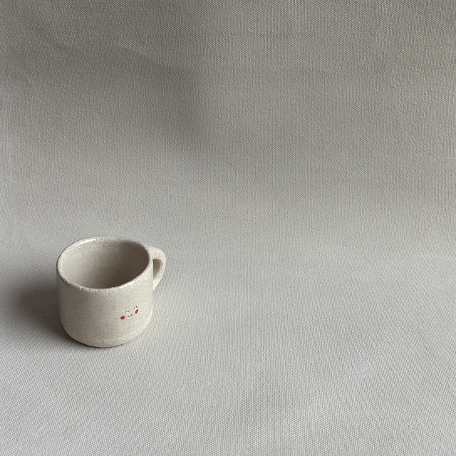 Tasse expresso visage heureux