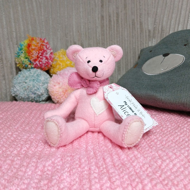 Alice. Small size, handmade teddy bear. UKCA. Tray base packaging. Standard Wool Felt. Baby pink. Cherry Blossom pink. Blush. White.