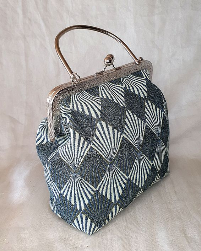 Nina bolso con boquilla y asa de mano tapicería geométrica Art Decó