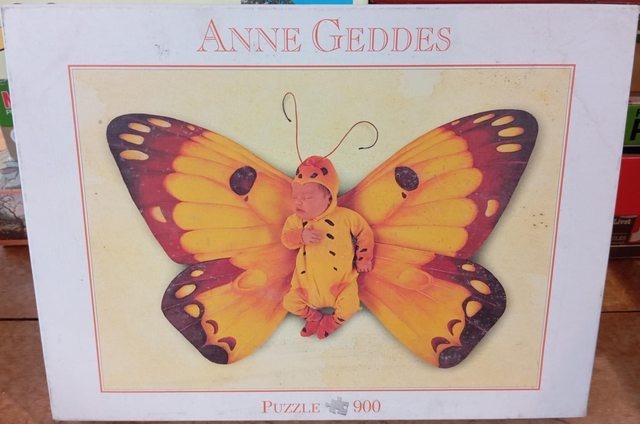 Puzzle 900 pièces Anne Geddes papillon 