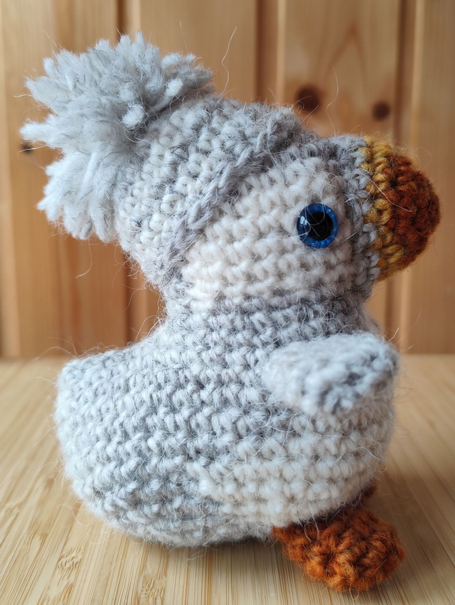 Shiny the white puffin with grey and white hat, medium size (made from Icelandic wool yarn)