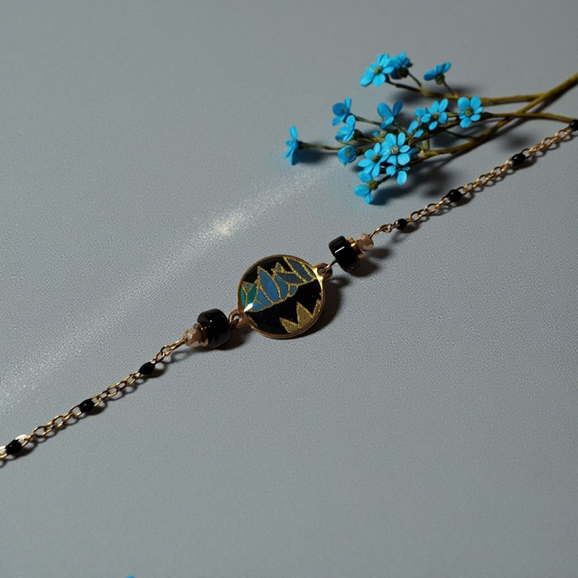 bracelet acier inoxydable motifs japonais noir bleu et doré