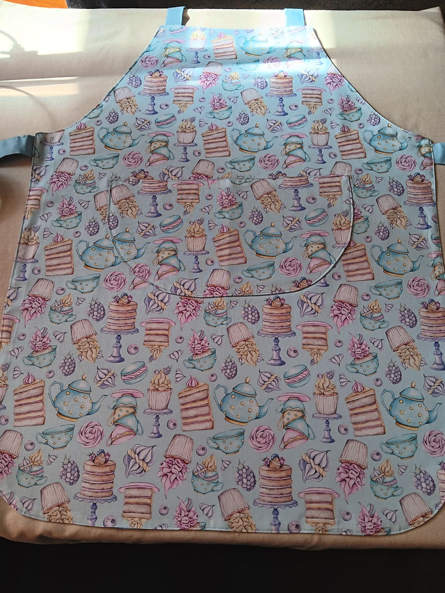 Adult Kitchen Apron Tea and Cakes Patterned Cotton Fabric with Front pocket and Pale blue lining, waist ties and adjustable neck ties
