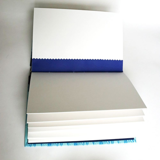 A5 book with buttonhole binding in blue