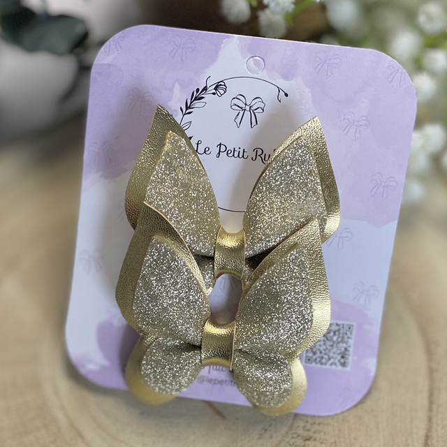 Paire de barrettes pappillon dorées