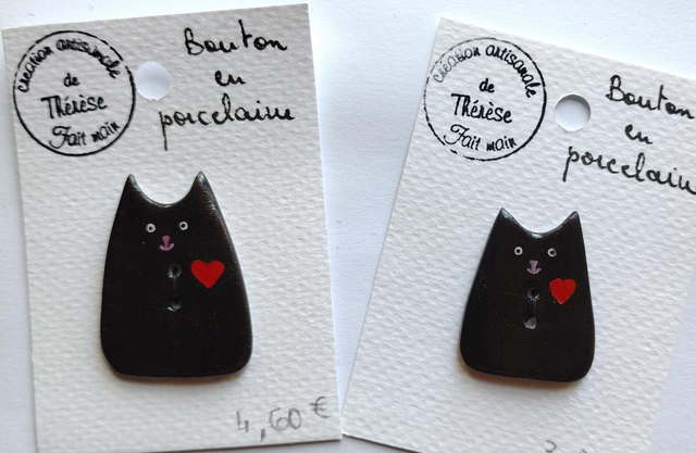 Bouton chat stylisé noir 