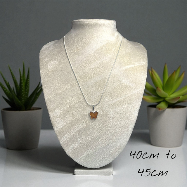 Amber and sterling silver pendant necklace