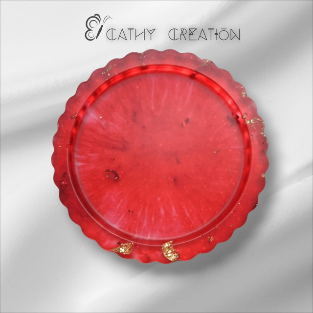 Sous verre rouge et feuilles d' or 