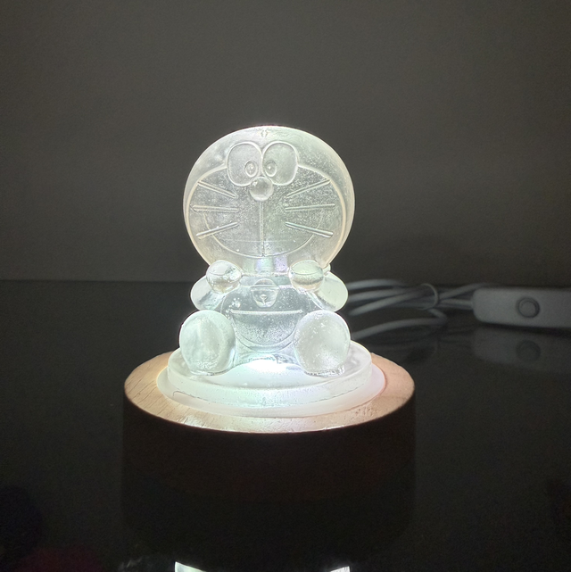 Fanart in resina trasparente con base luminosa