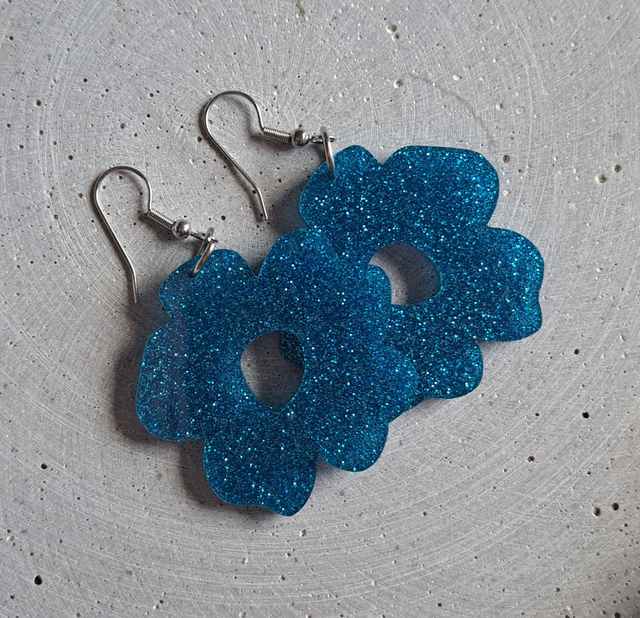 A -Floora -korvakorut, sininen glitter