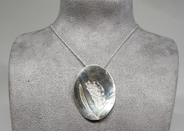 Lavender imprinted pendant on silver necklace