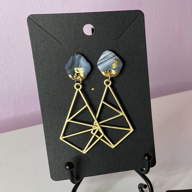 Black Marble With Gold Leaf And Gold Geometric Accessories 