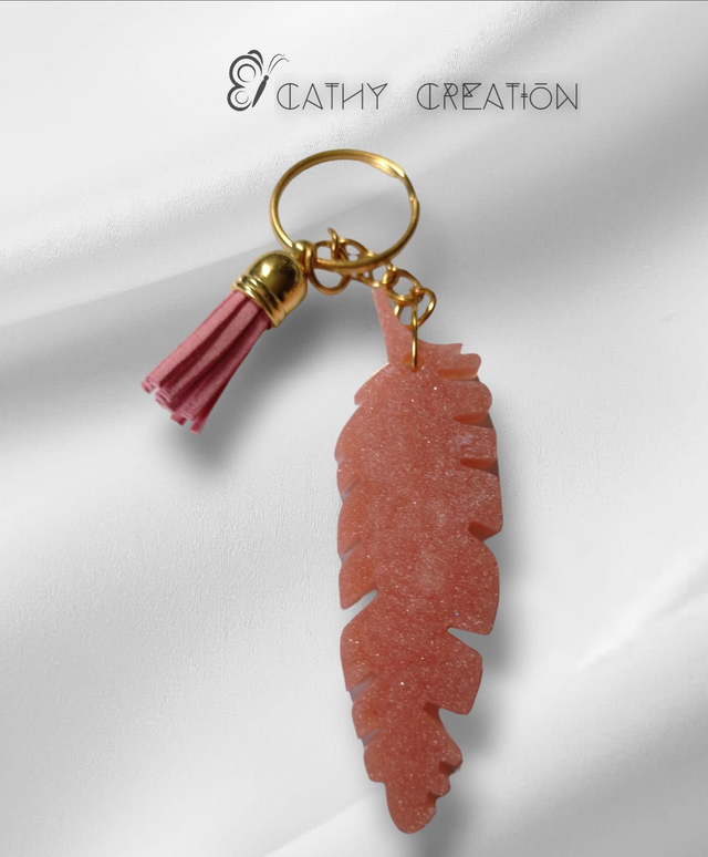 Porte clés plume rose