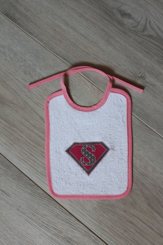 Bavoir attache ficelle