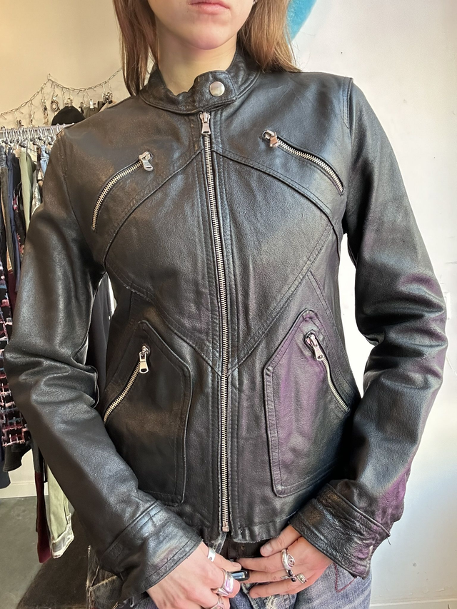 black leather jacket with front zipper pockets