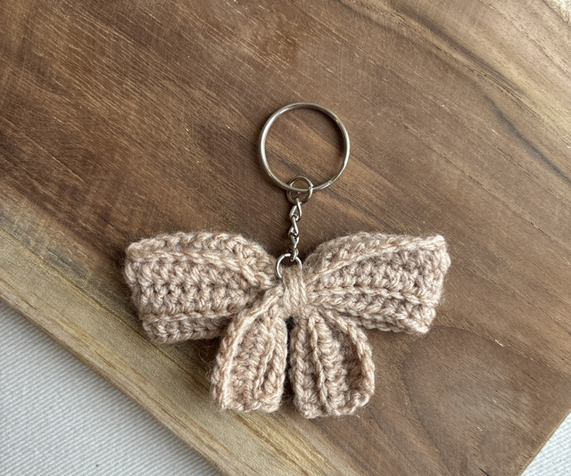 Porte clé noeud beige 