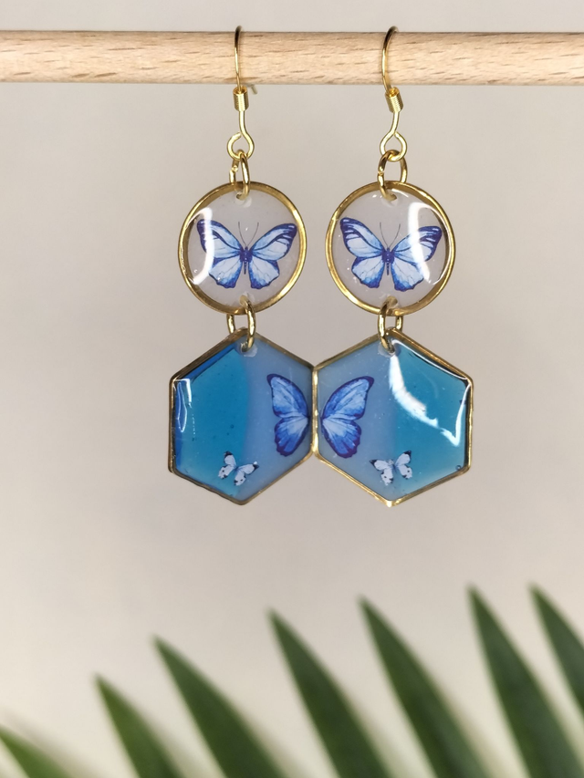 Boucles papillons bleus