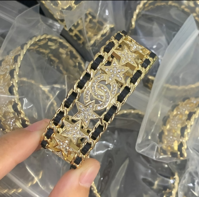 Bracelets CH doré deux bandes noires avec strass