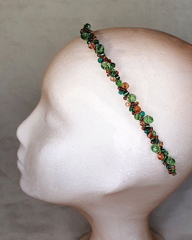 Aril diadema joya cristales verdes y ambar