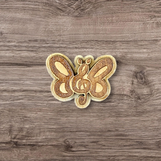 Pin's papillon musical 