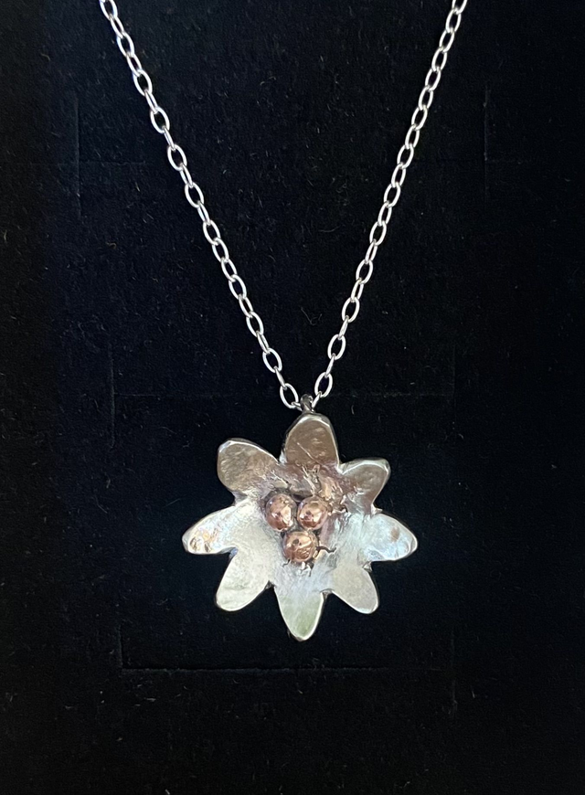 Lilly in hammered sterling silver with copper detailing