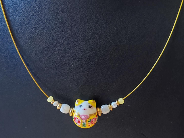 Collier chat porcelaine jaune 